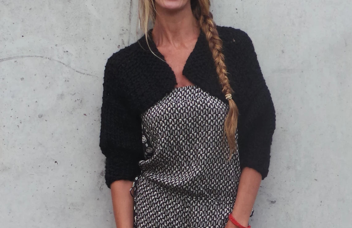 Black shrug short puff sleeved alpaca mix bolero