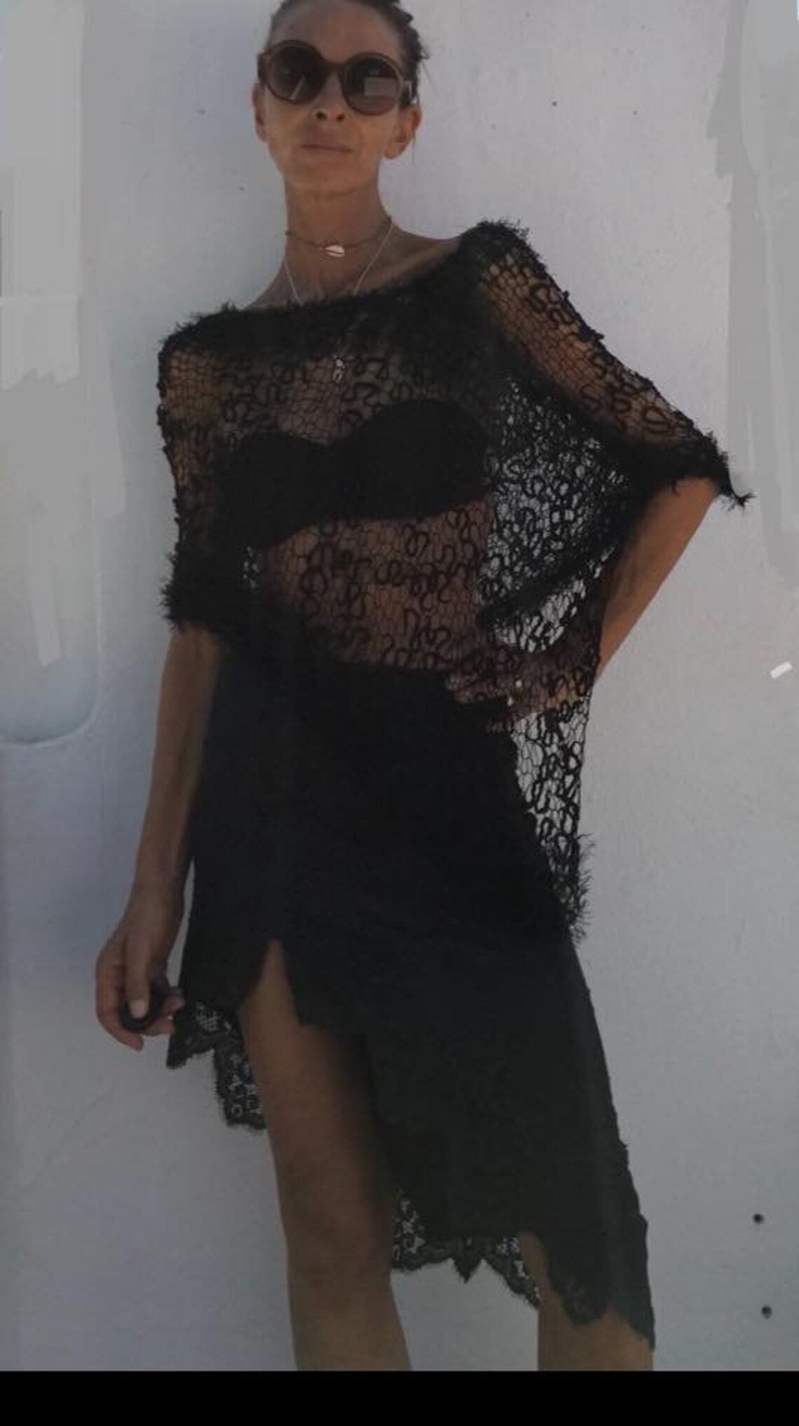 Black poncho with faux fur trims sheer knit evening cover up