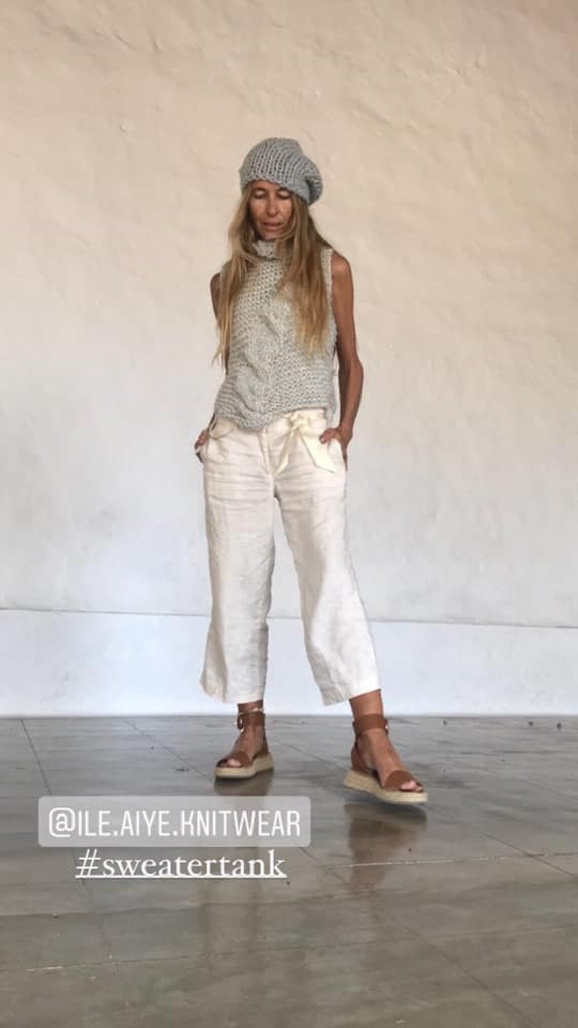 Silver cable knit tank with an asymmetric collar