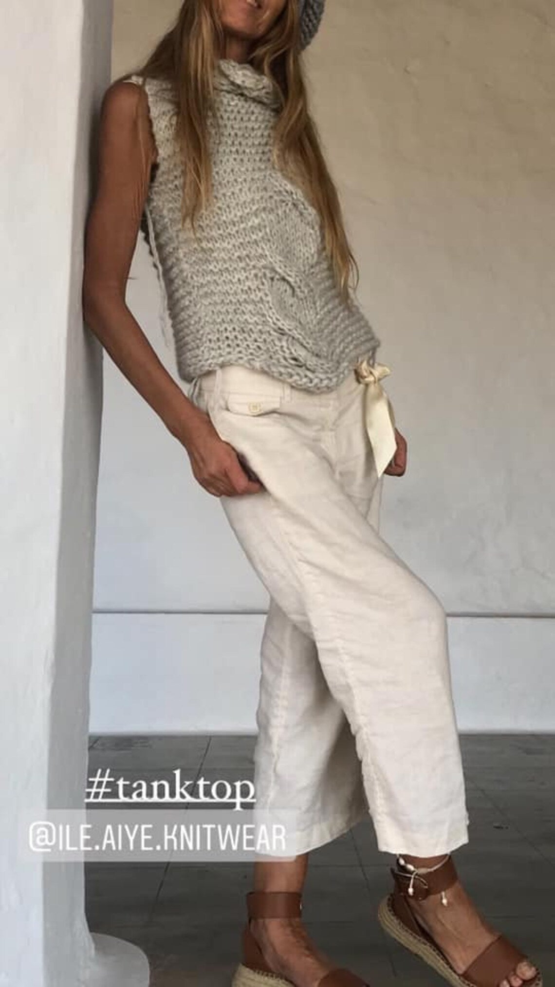 Silver cable knit tank with an asymmetric collar