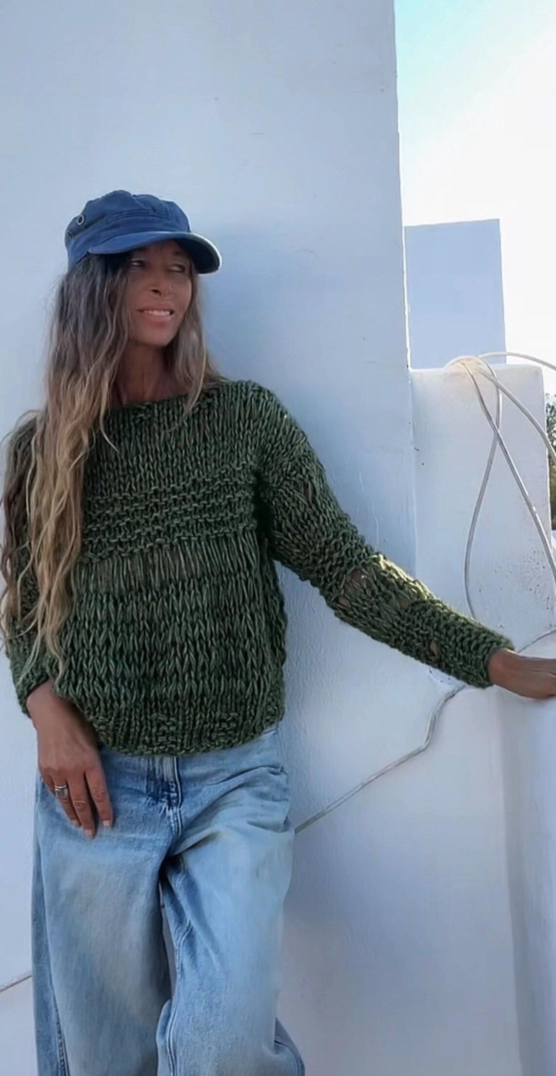 Olive green loose knit pullover sweater with thumbholes