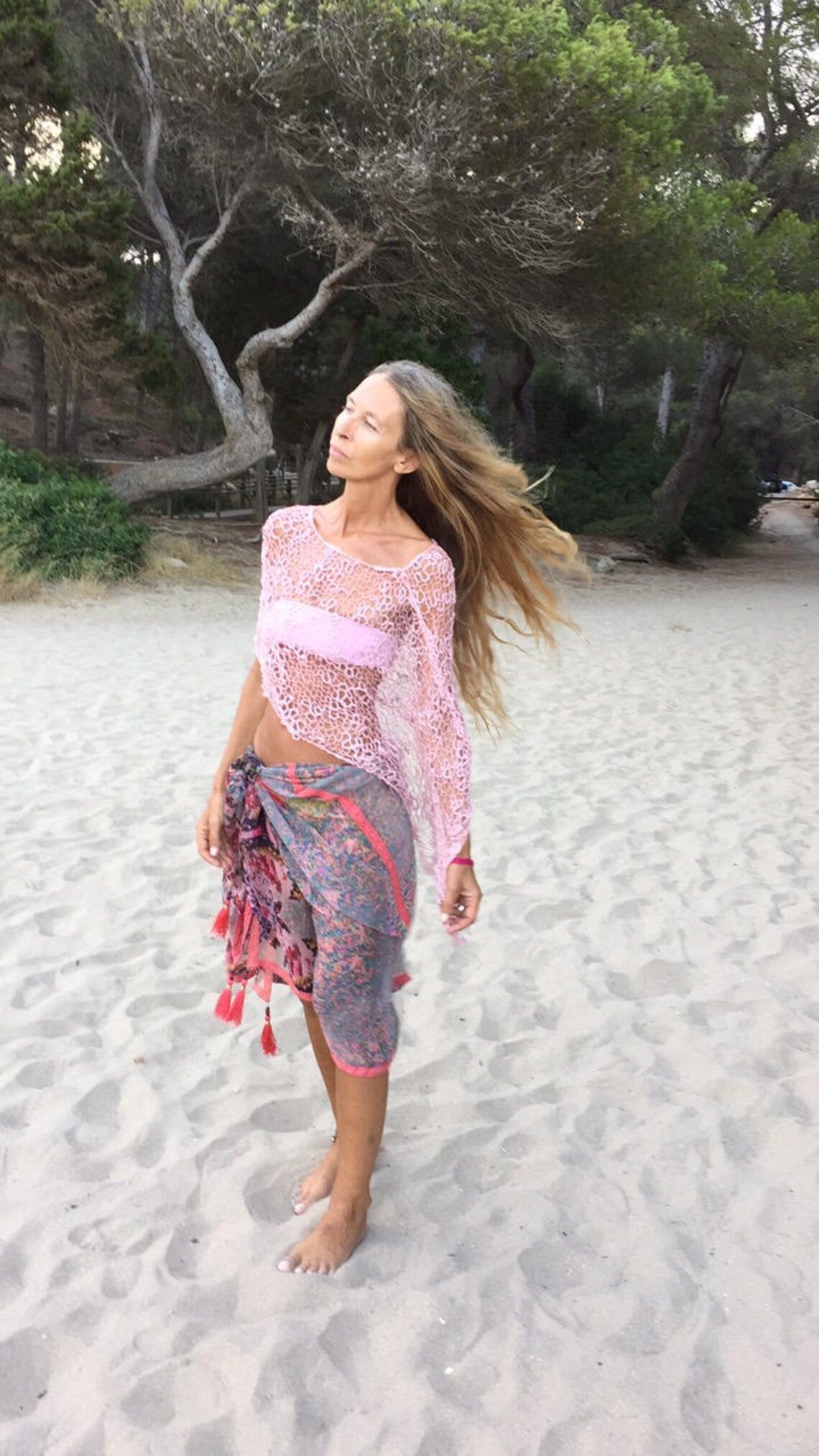 Pink sheer knit poncho