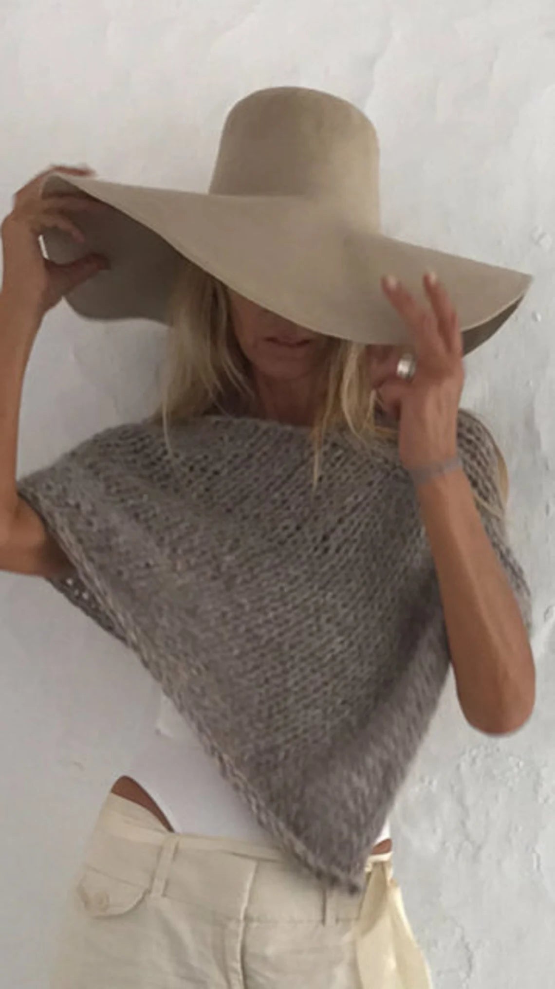 Beige poncho alpaca hand-knit sustainable ethical fashion