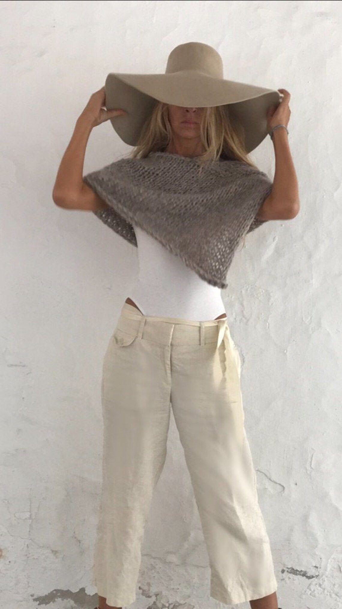 Beige poncho alpaca hand-knit sustainable ethical fashion